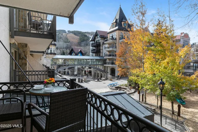 a view of a balcony dining area