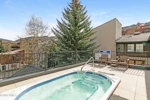 a front view of a building with glass windows