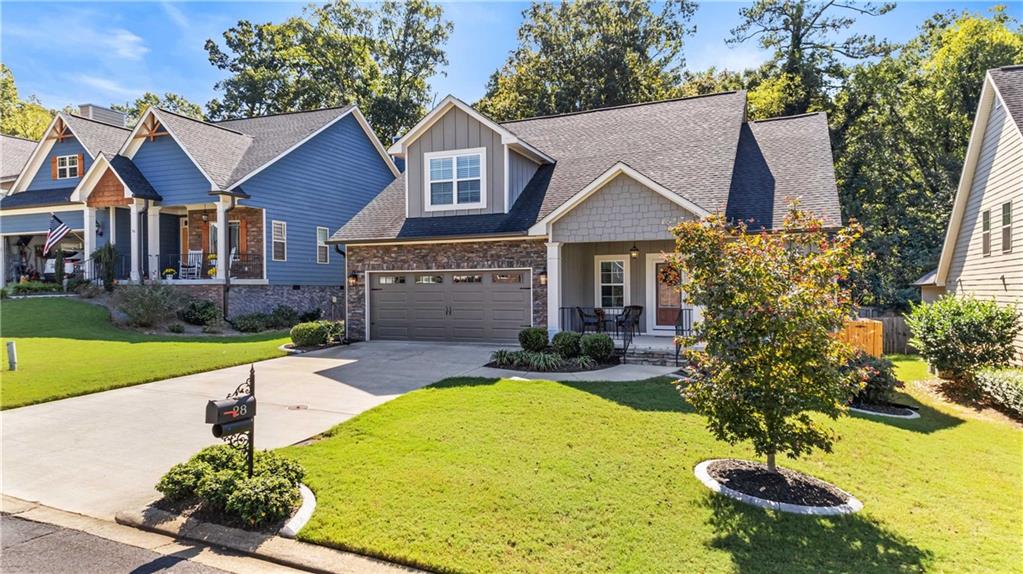 28 Greer Drive Northeast Rome, GA 30161 - Photo 1 of 1 a front view of a house with yard and green space