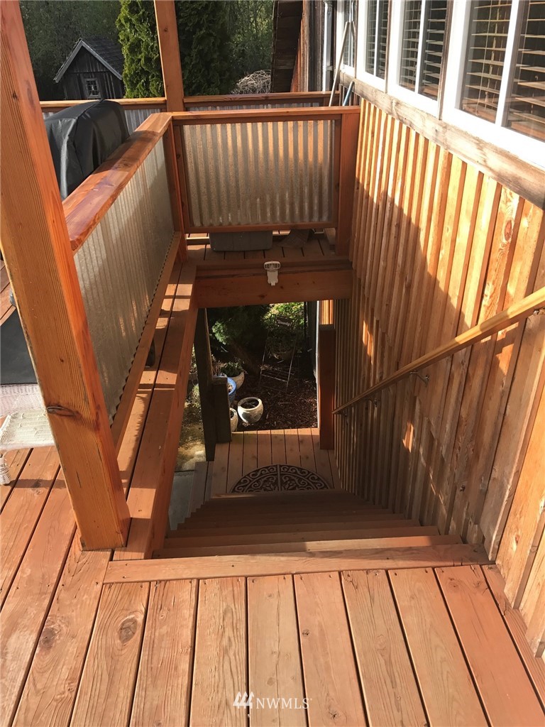 18527 Beall Road Southwest Vashon, WA 98070 - Photo 5 of 26 a view of balcony with wooden floor