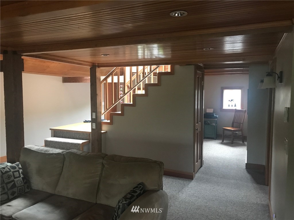 18527 Beall Road Southwest Vashon, WA 98070 - Photo 7 of 26 a view of entryway and hall with wooden floor
