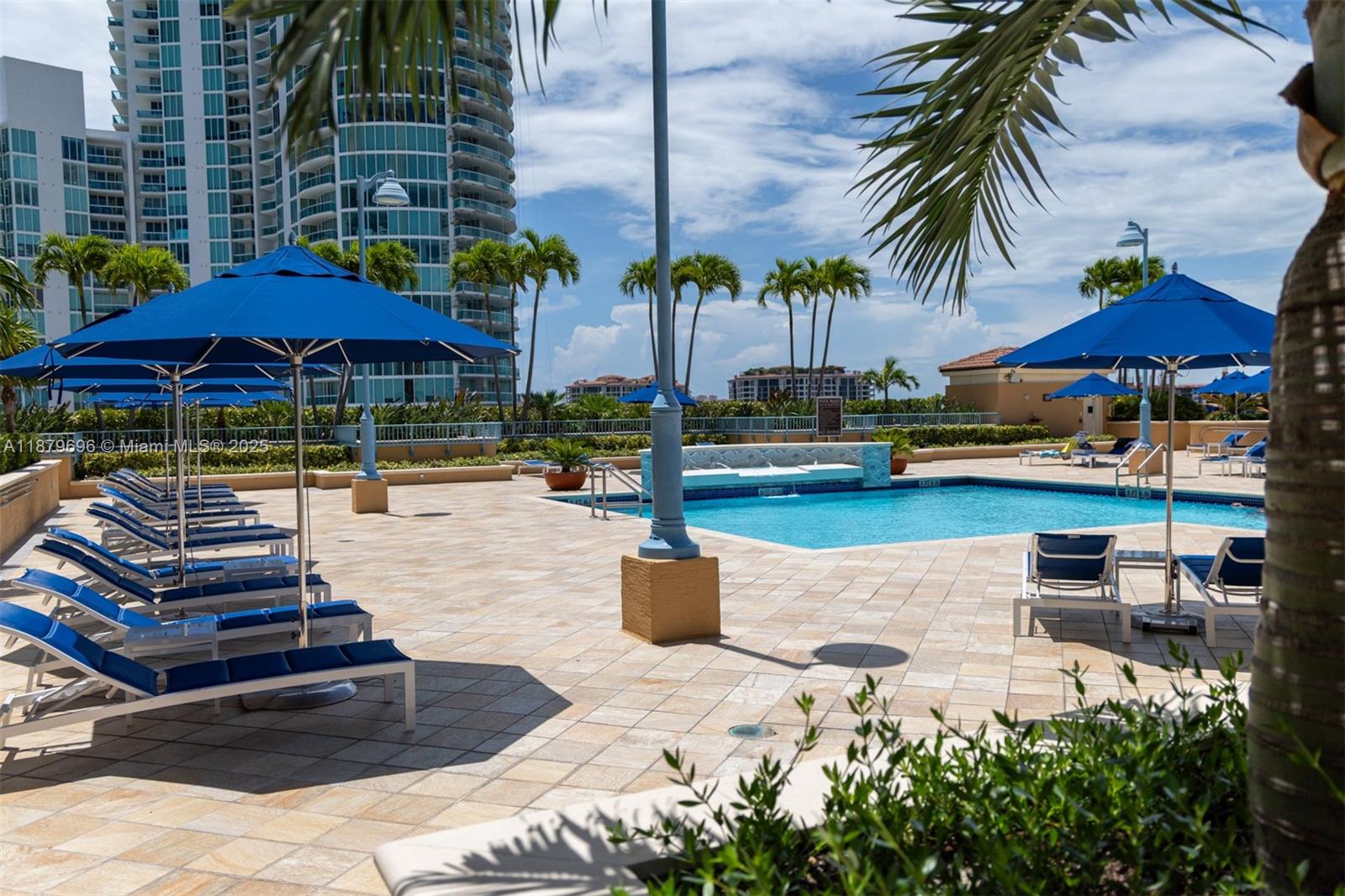 90 Alton Road, Unit 1703 Miami Beach, FL 33139 - Photo 28 of 48 a view of swimming pool with outdoor seating