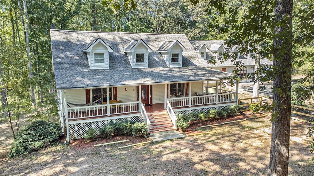 3123 Jonesboro Road Hampton, GA 30228 - Photo 1 of 1 a front view of a house with a yard