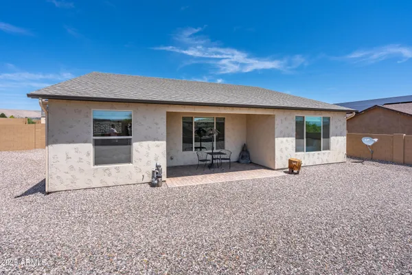a house with yard in front of it