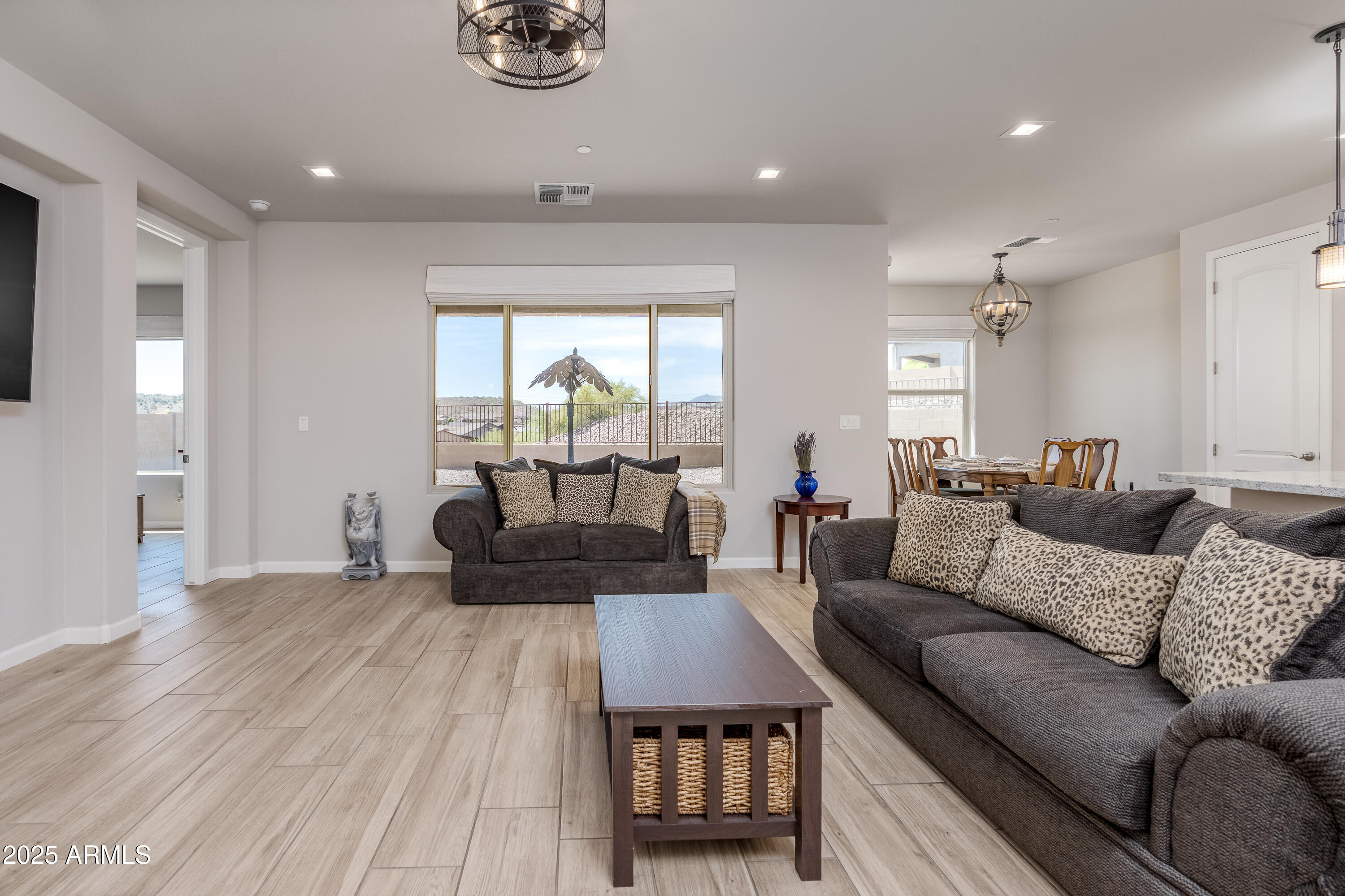 439 McKinnon Road Clarkdale, AZ 86324 - Photo 5 of 39 a living room with furniture and a large window