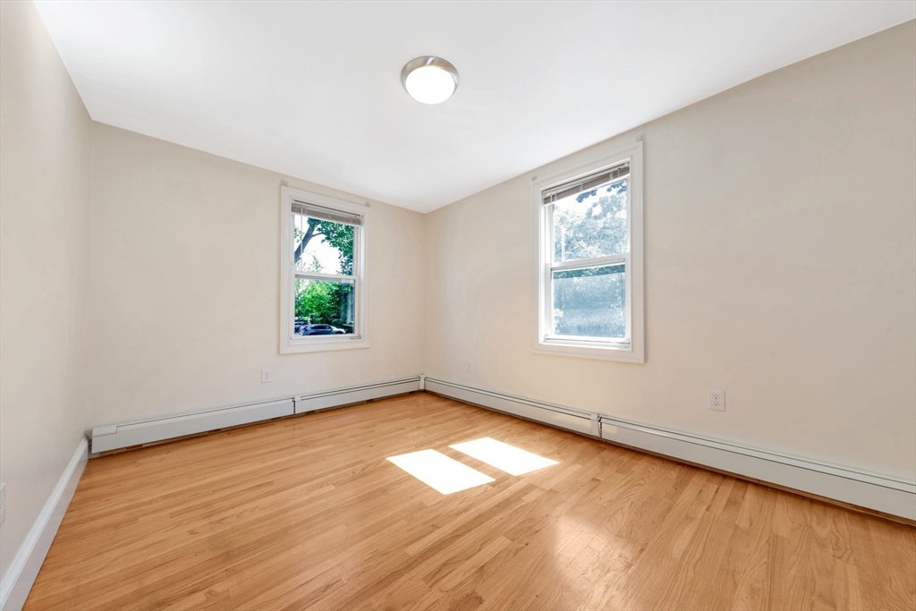 4 School Street, Unit 2 Boston, MA 02119 - Photo 13 of 25 an empty room with window