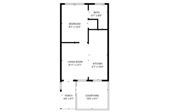 a picture of a bench in front of a wall