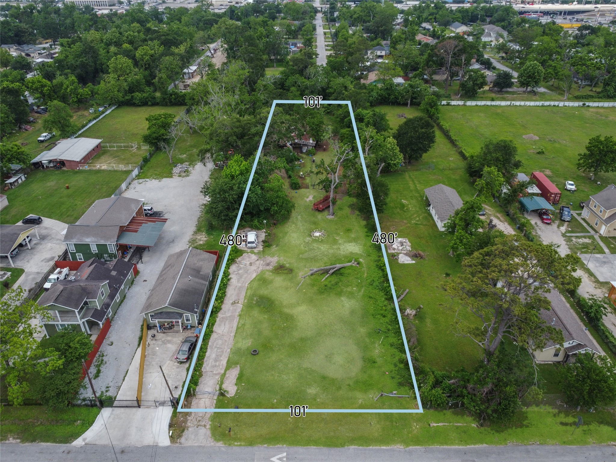 an aerial view of a golf course with a lake view
