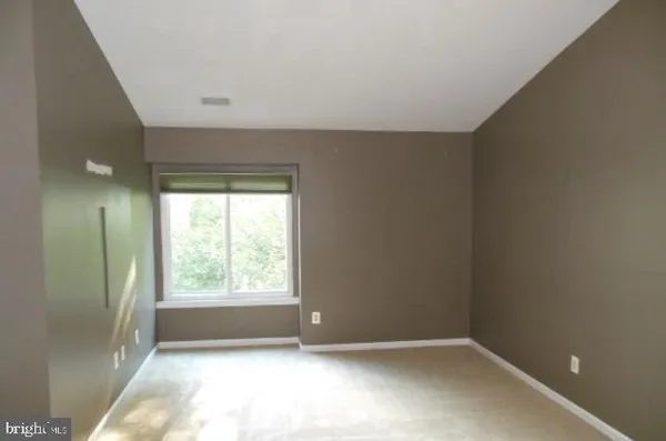 a view of entryway with a front door