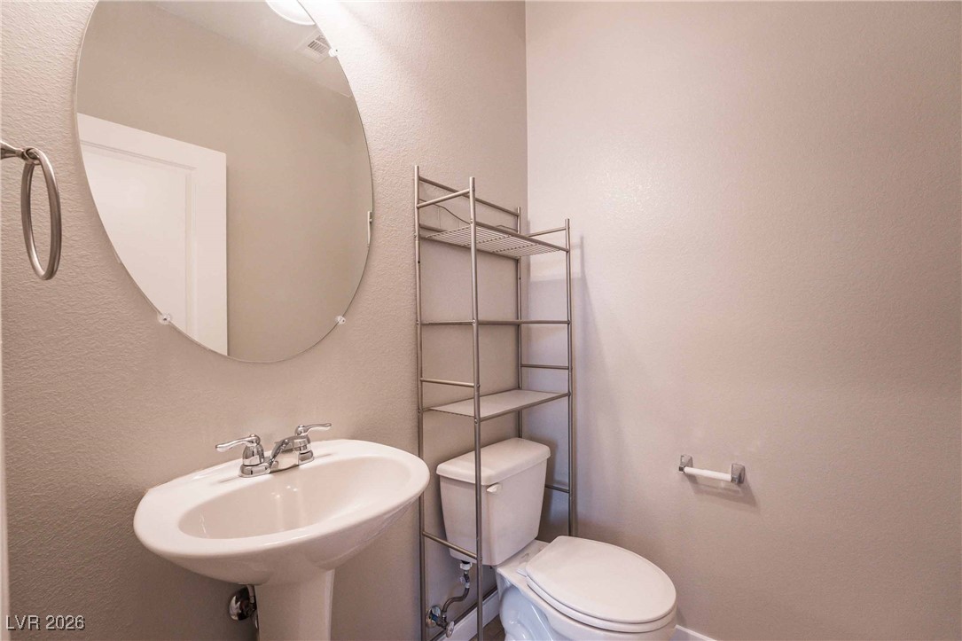 1129 Ricavoli Court Henderson, NV 89052 - Photo 22 of 26 Guest bathroom upper level