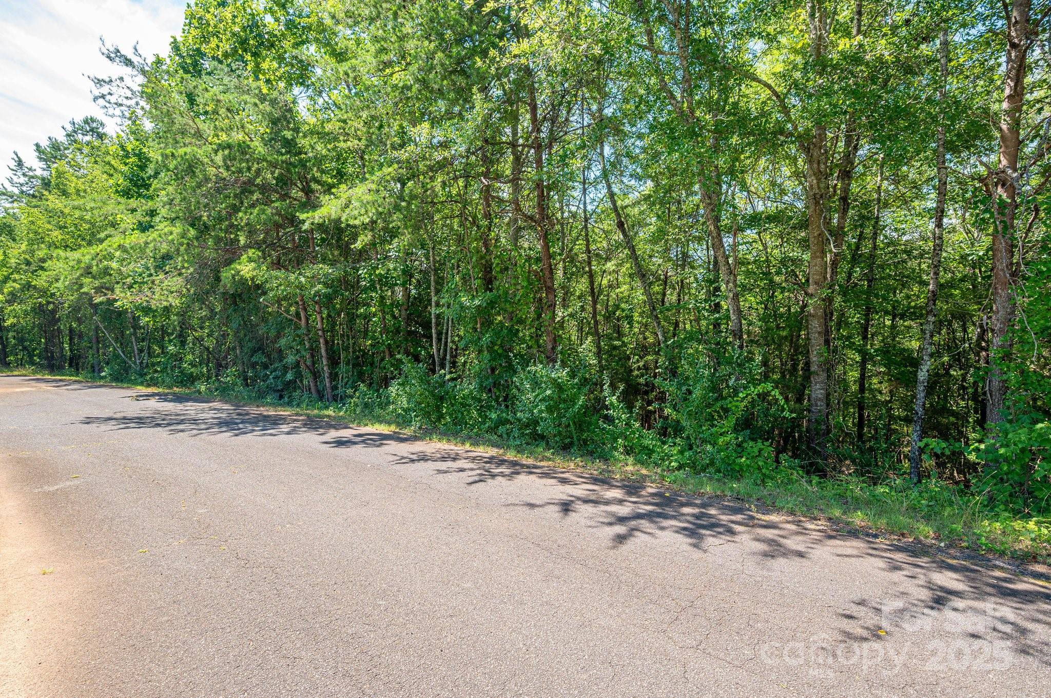 Lot 7 Meadow Crossing Drive Rutherfordton, NC 28139 - Photo 13 of 15 a wooden bench with view of road