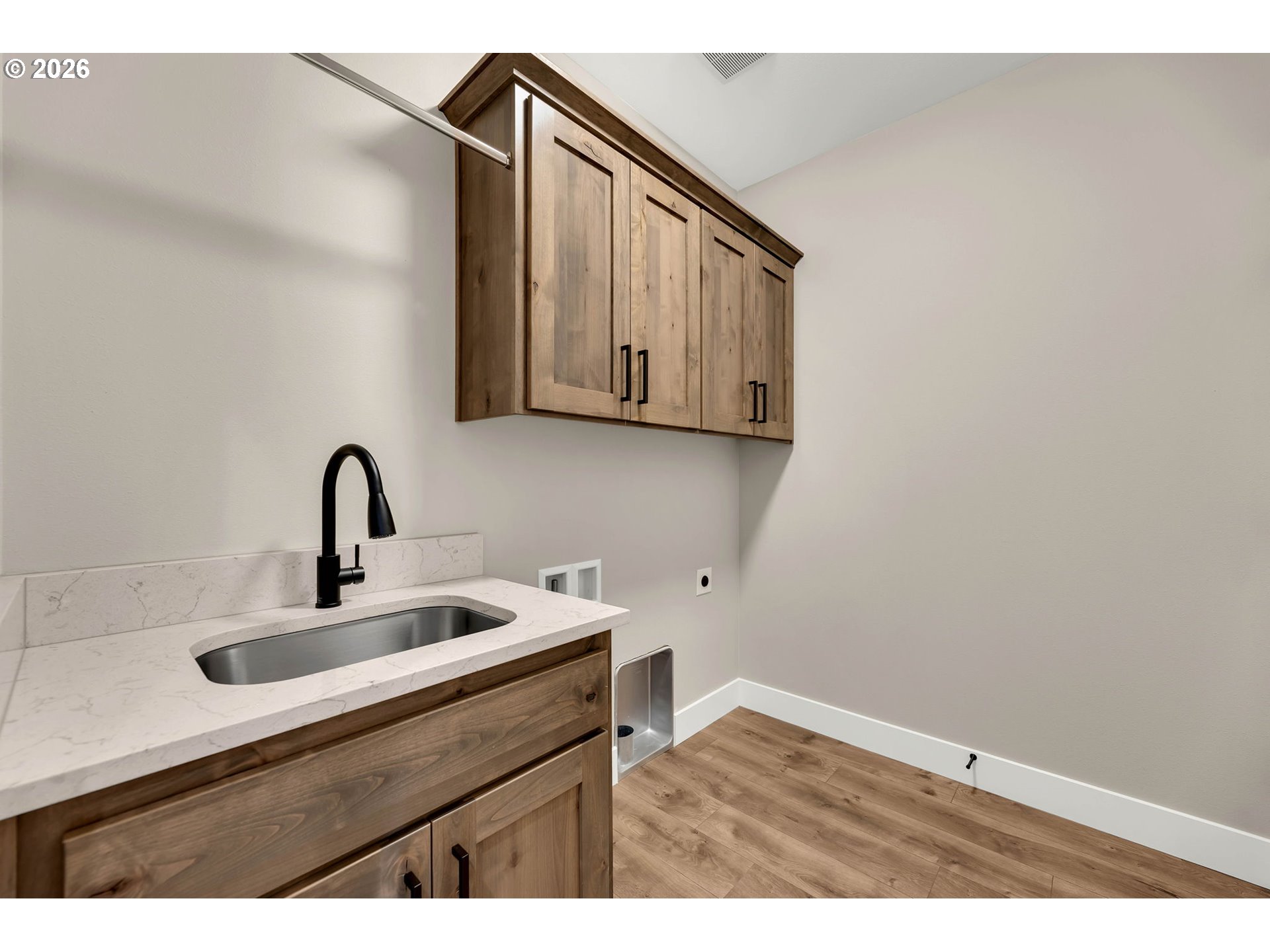 814 Southeast 35th Street Battle Ground, WA 98604 - Photo 11 of 37 a kitchen with a sink cabinets and utility