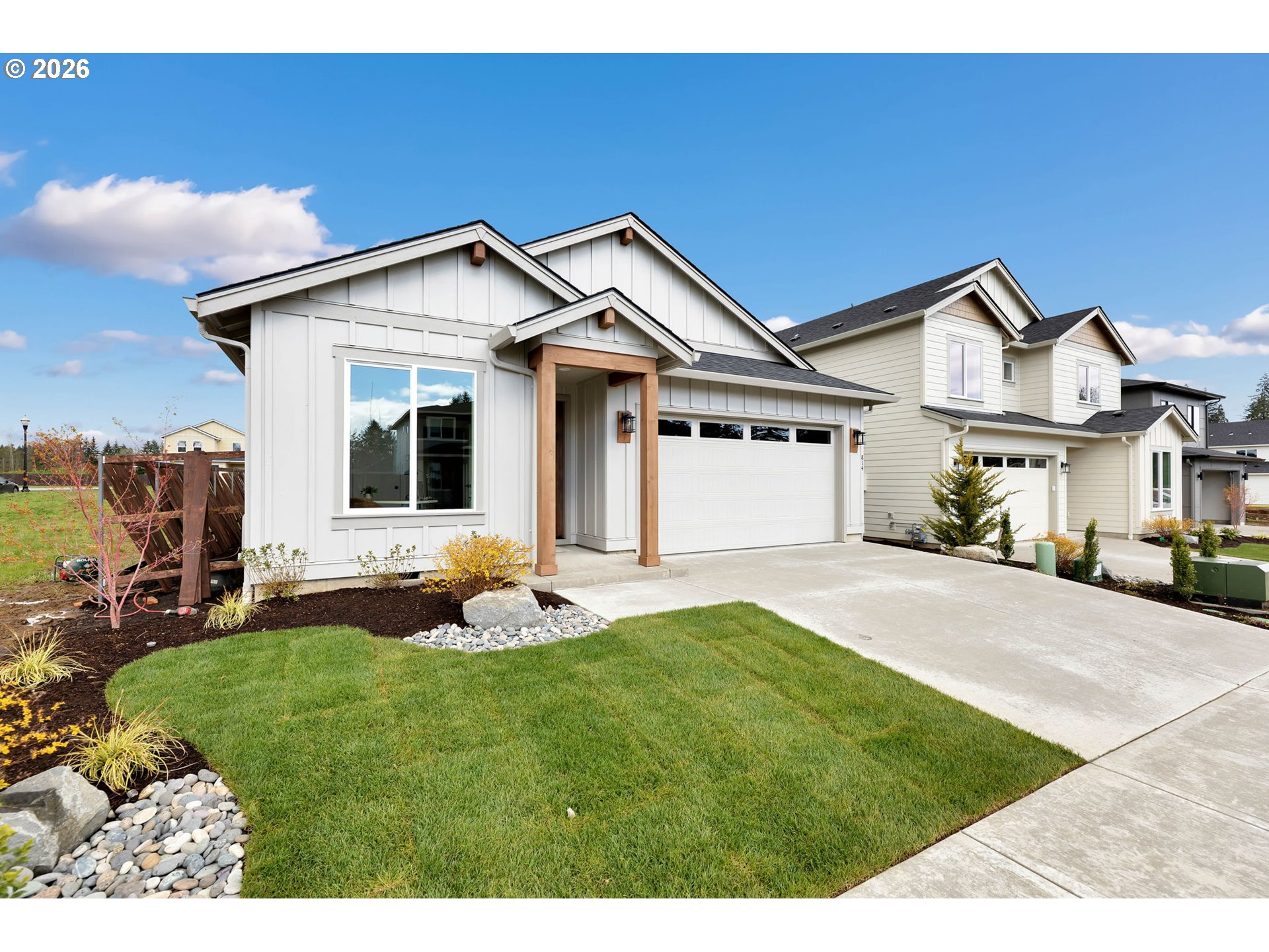 814 Southeast 35th Street Battle Ground, WA 98604 - Photo 2 of 37 a front view of a house with garden