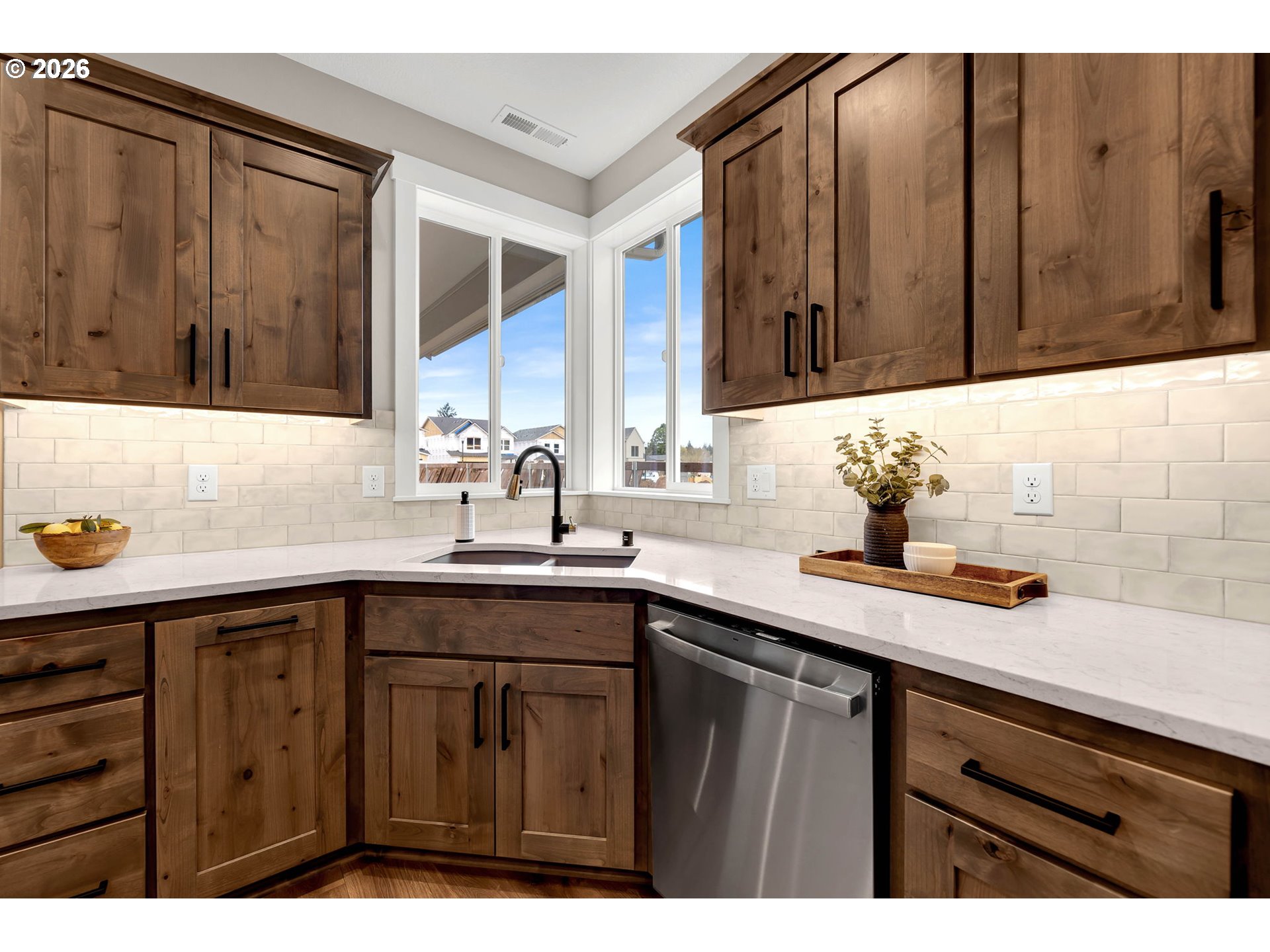814 Southeast 35th Street Battle Ground, WA 98604 - Photo 22 of 37 a kitchen with a sink and cabinets