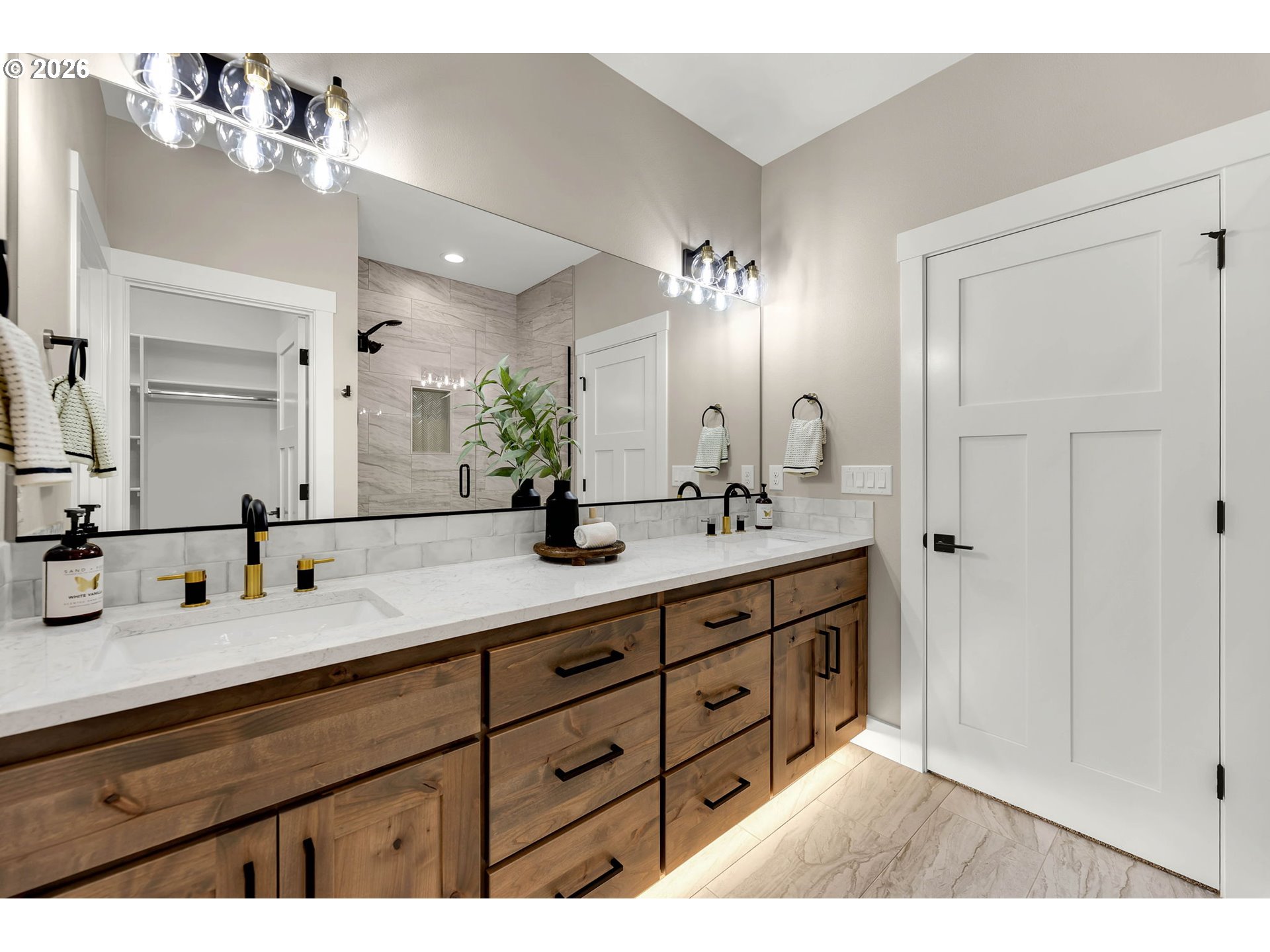 814 Southeast 35th Street Battle Ground, WA 98604 - Photo 34 of 37 a bathroom with a double vanity sink and a mirror