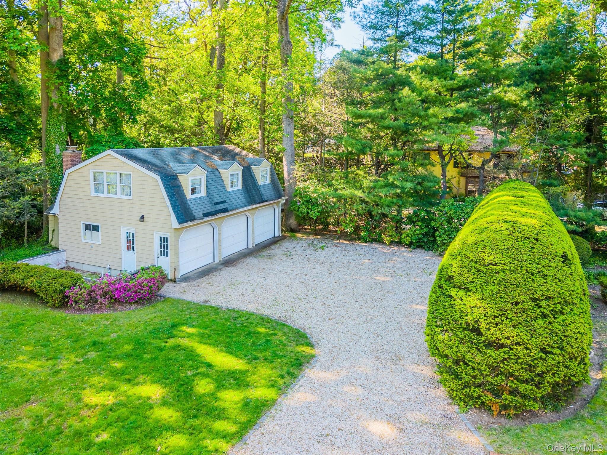 23 Townsend Road Glen Cove, NY 11542 - Photo 5 of 23 a view of a garden with swimming pool