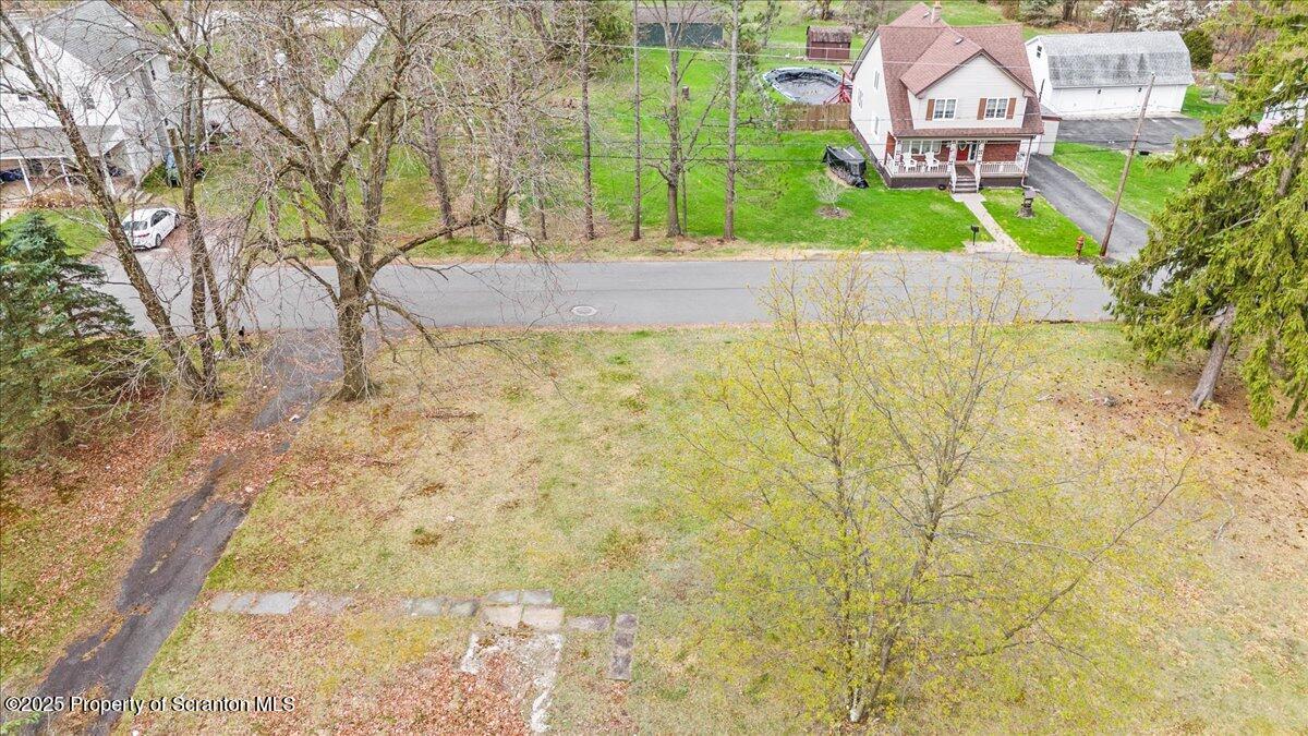 1729 East Elm Street Scranton, PA 18505 - Photo 14 of 14 a view of a brick wall with a tree in front of it