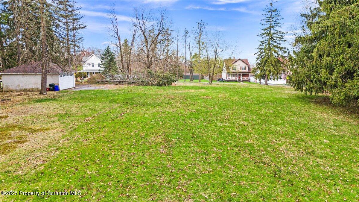 1729 East Elm Street Scranton, PA 18505 - Photo 3 of 14 a view of a park with large trees