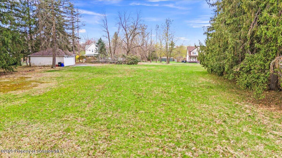 1729 East Elm Street Scranton, PA 18505 - Photo 10 of 14 a view of a house with a yard and tree s