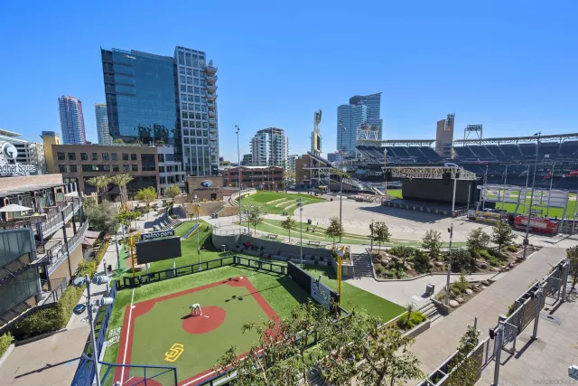 a view of a pathway with house on both side