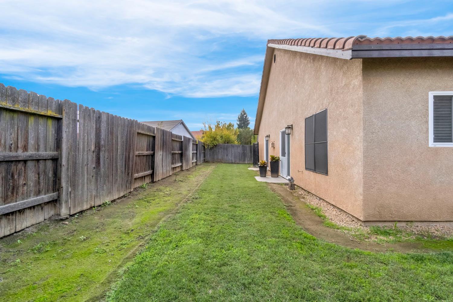 2634 Marie Drive Madera, CA 93637 - Photo 30 of 32 a view of a back yard of the house