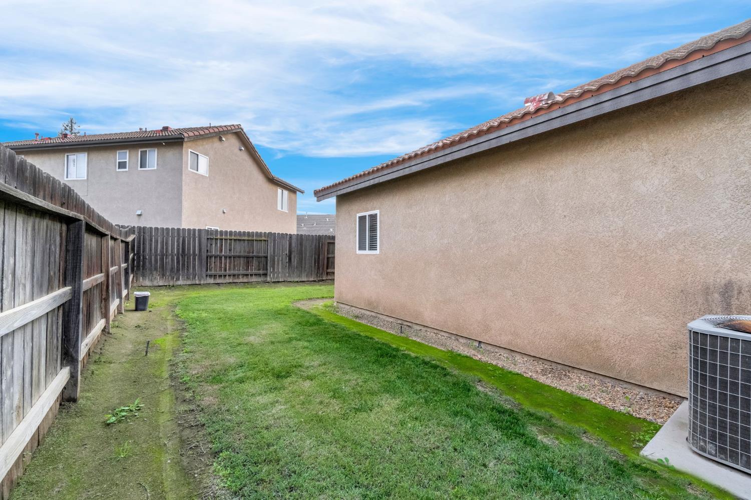 2634 Marie Drive Madera, CA 93637 - Photo 31 of 32 a view of an house with backyard and garden