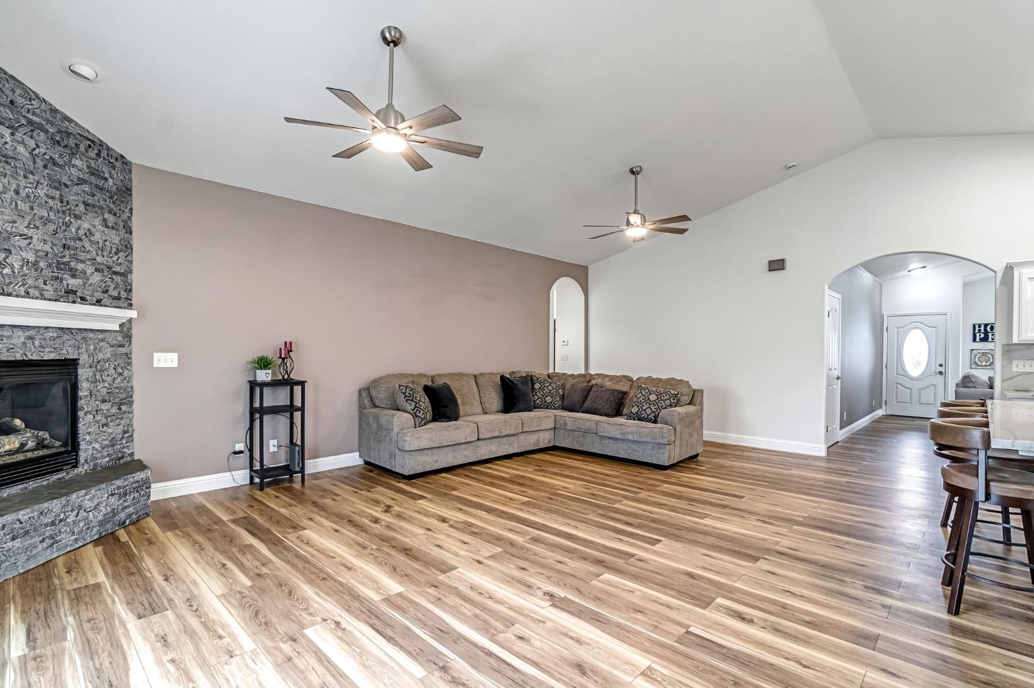 2634 Marie Drive Madera, CA 93637 - Photo 8 of 32 a living room with furniture and a fireplace
