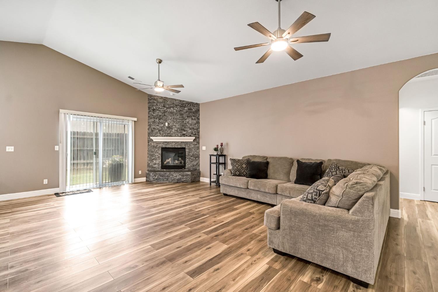 2634 Marie Drive Madera, CA 93637 - Photo 9 of 32 a living room with furniture and a fireplace