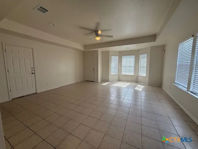 a view of a livingroom with a staircase