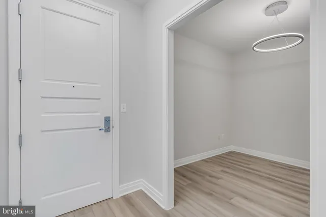 a view of a livingroom with wooden floor