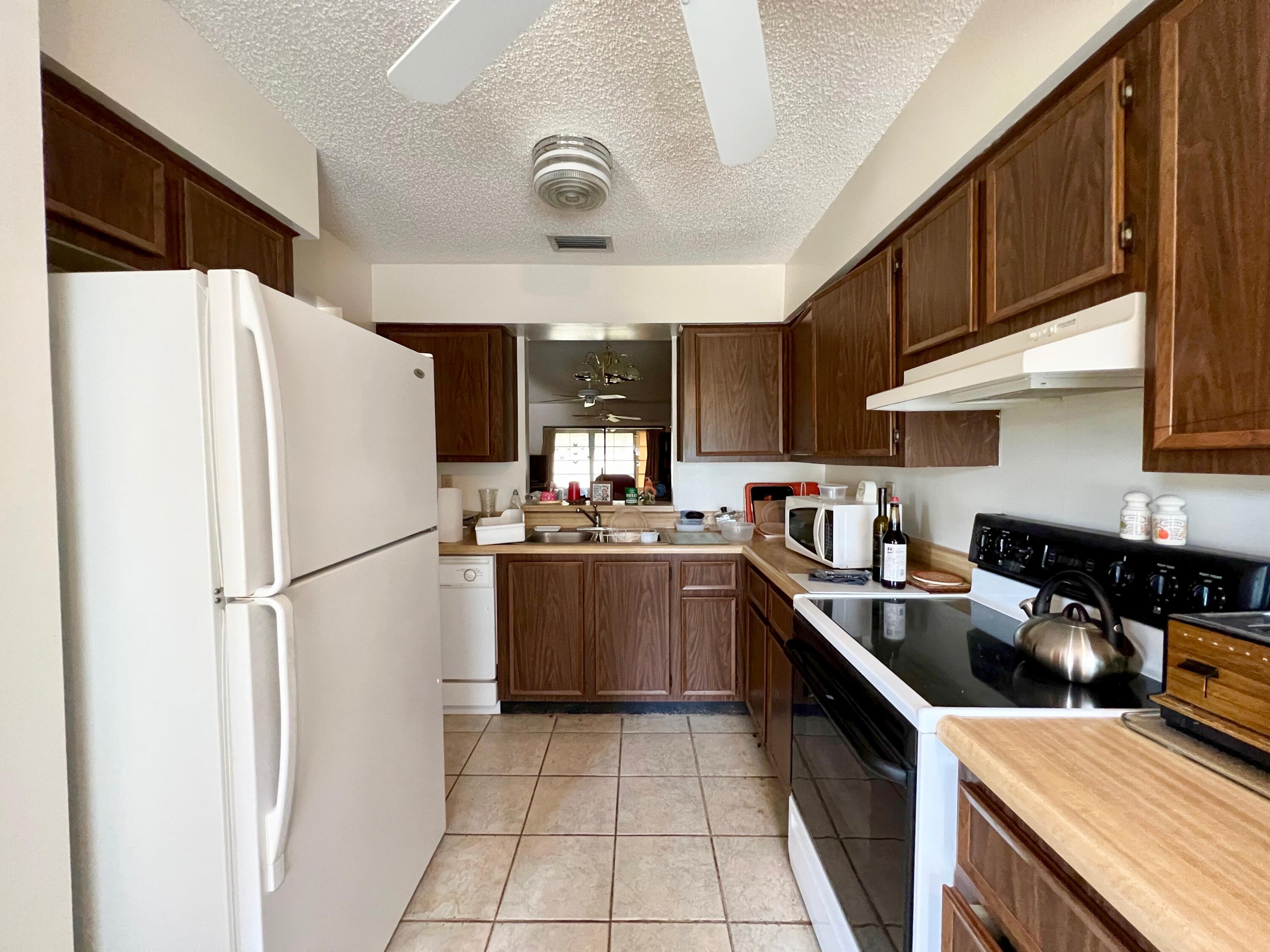 6024 Indrio Road, Unit L6 Fort Pierce, FL 34951 - Photo 6 of 17 IMG_4958