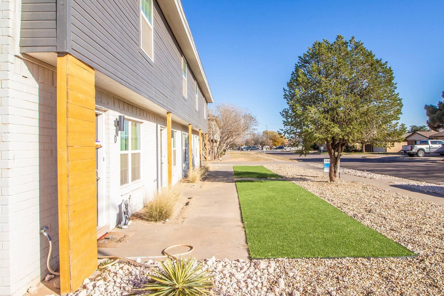 5806 6th Street, Unit B Lubbock, TX 79416 - Photo 40 of 45 a view of a back yard of the house
