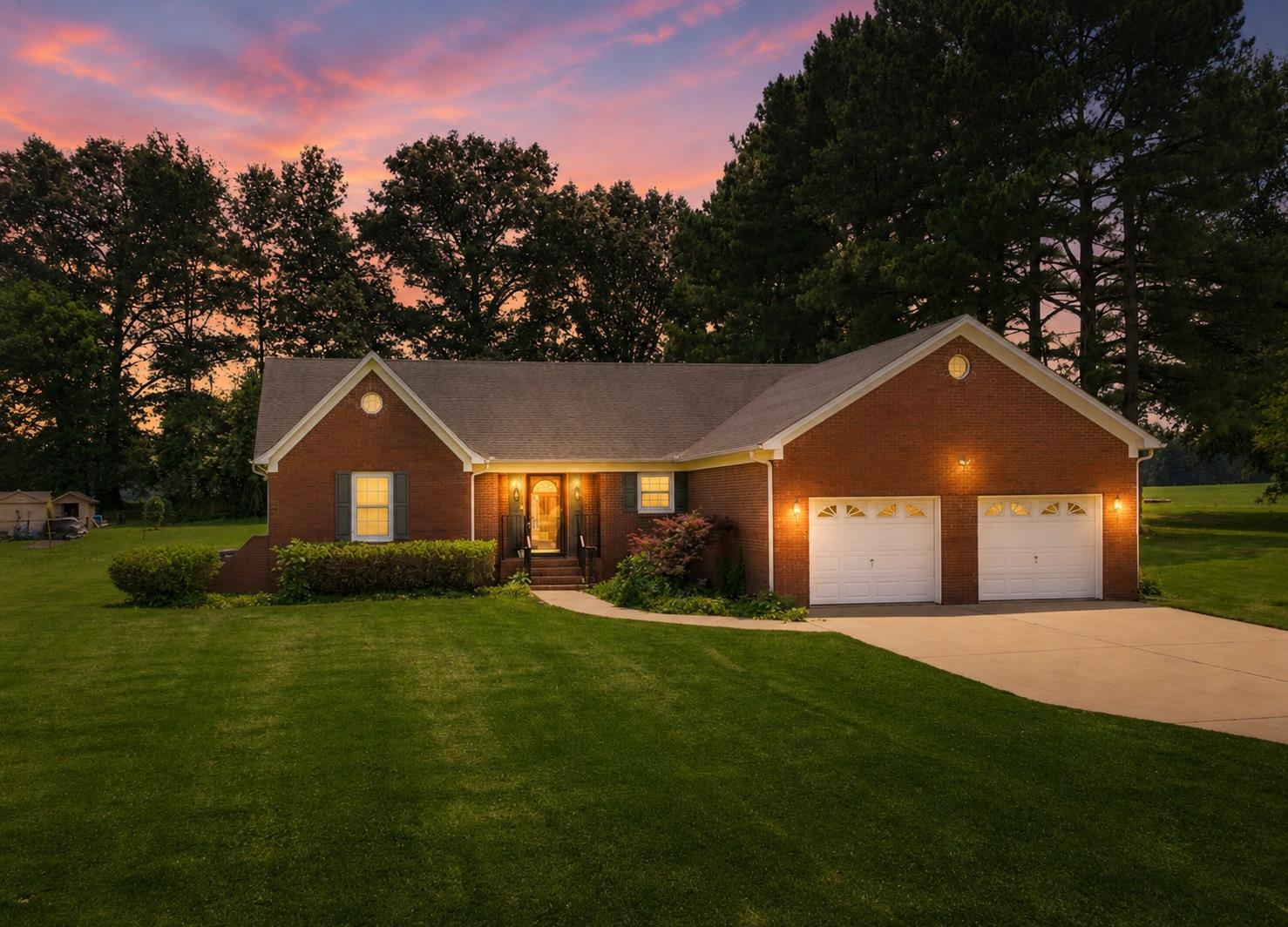 171 Brierhedge Road Covington, TN 38019 - Photo 1 of 39 Nestled on a beautifully manicured homesite, this home offers the perfect blend of privacy, space, and convenience. Timeless curb appeal, mature shade trees with large backyard, covered patio and workshop. Privacy fence installation could be negotiable.