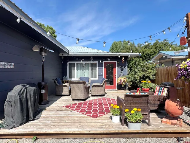 a view of a backyard of the house