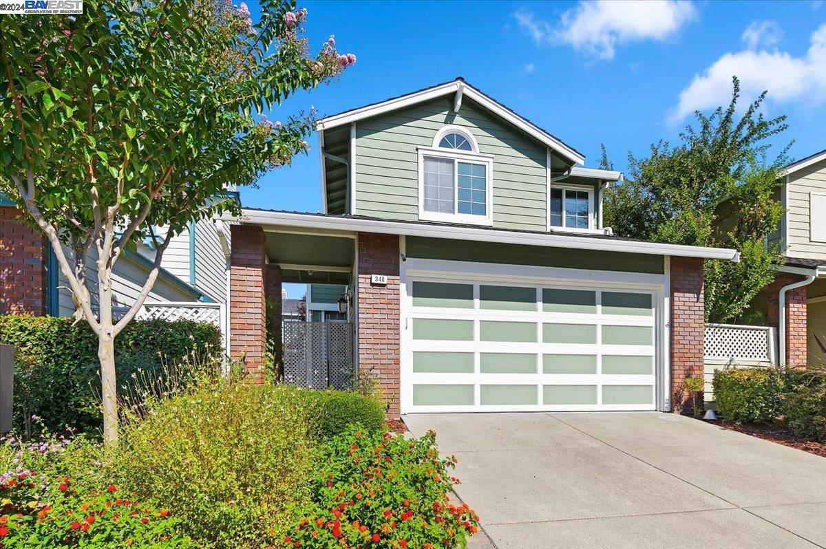 340 Winterwind Circle San Ramon, CA 94583 - Photo 1 of 1 front view of a house with a yard and potted plants