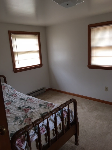 2146 Mt Torrey Road Lyndhurst, VA 22952 - Photo 14 of 15 a bedroom with a bed with window