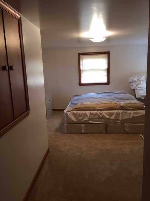 2146 Mt Torrey Road Lyndhurst, VA 22952 - Photo 15 of 15 a bedroom with a bed and a window