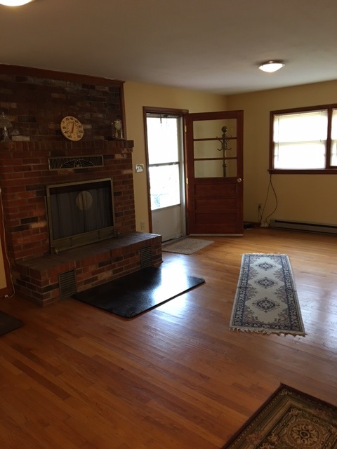 2146 Mt Torrey Road Lyndhurst, VA 22952 - Photo 9 of 15 an empty room with windows and fireplace