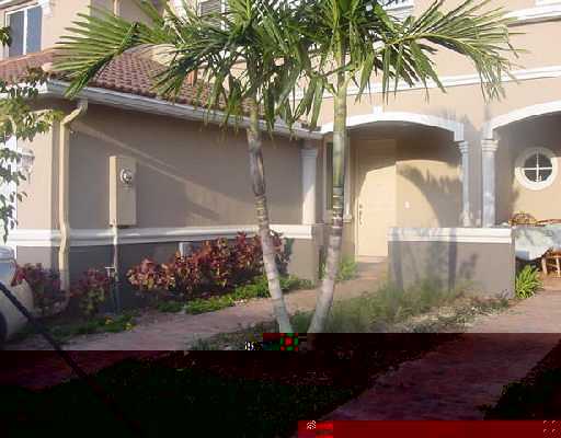 2067 Oakhurst Way, Unit 46 Riviera Beach, FL 33404 - Photo 1 of 16 Primary Photo