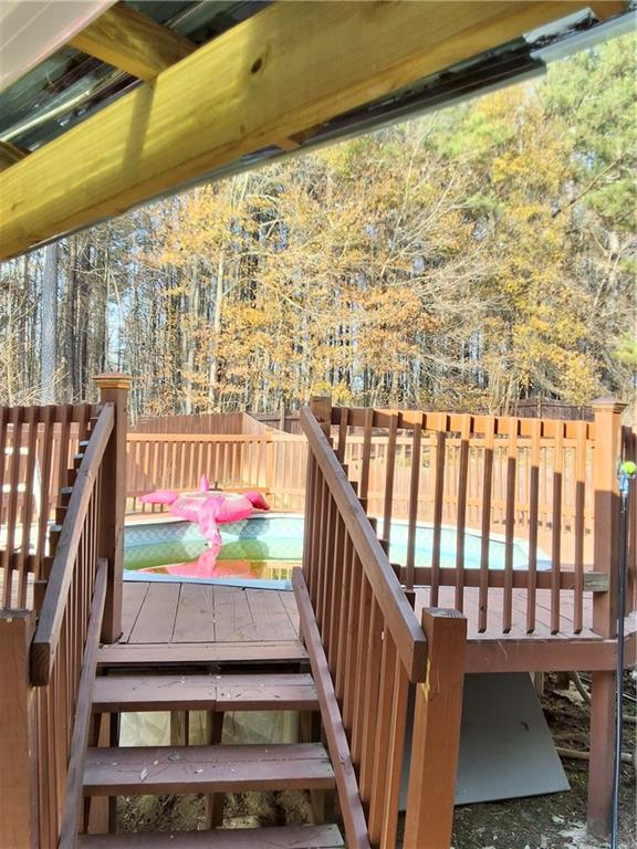 2909 Gala Trail Southwest Snellville, GA 30039 - Photo 22 of 22 a view of balcony with wooden floor and outdoor space