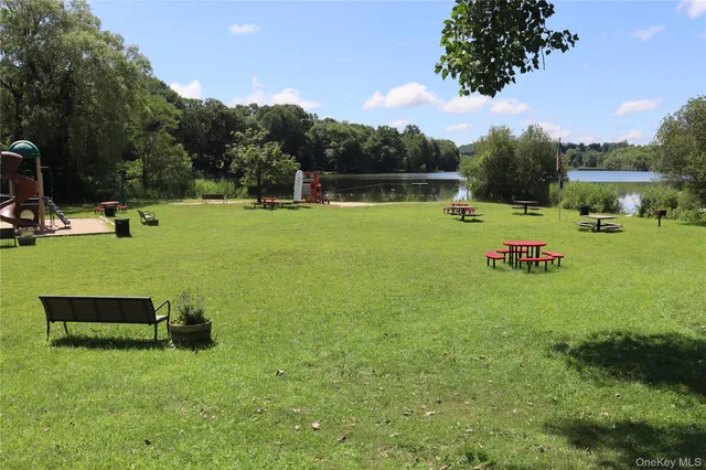 a view of a lake with a yard