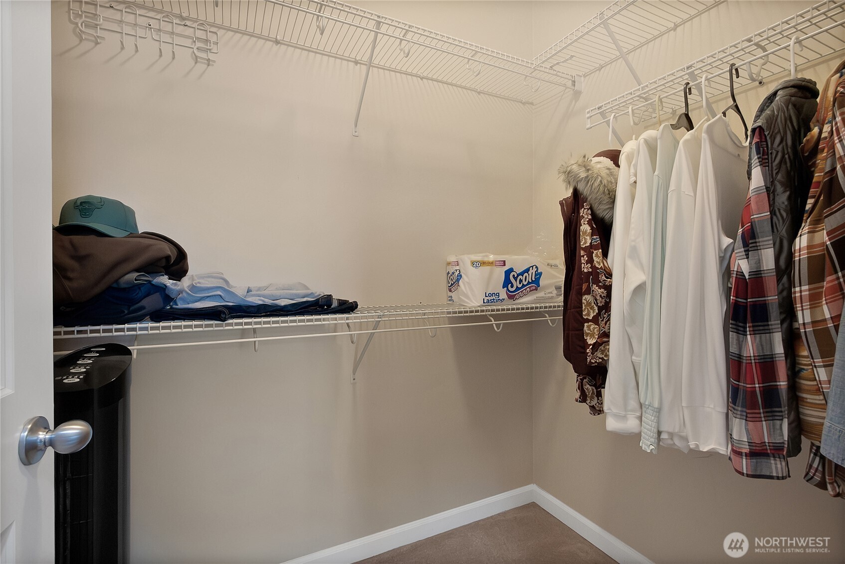 509 Balmer Street Southwest Orting, WA 98360 - Photo 12 of 22 a view of walk in closet with clothes and shoes