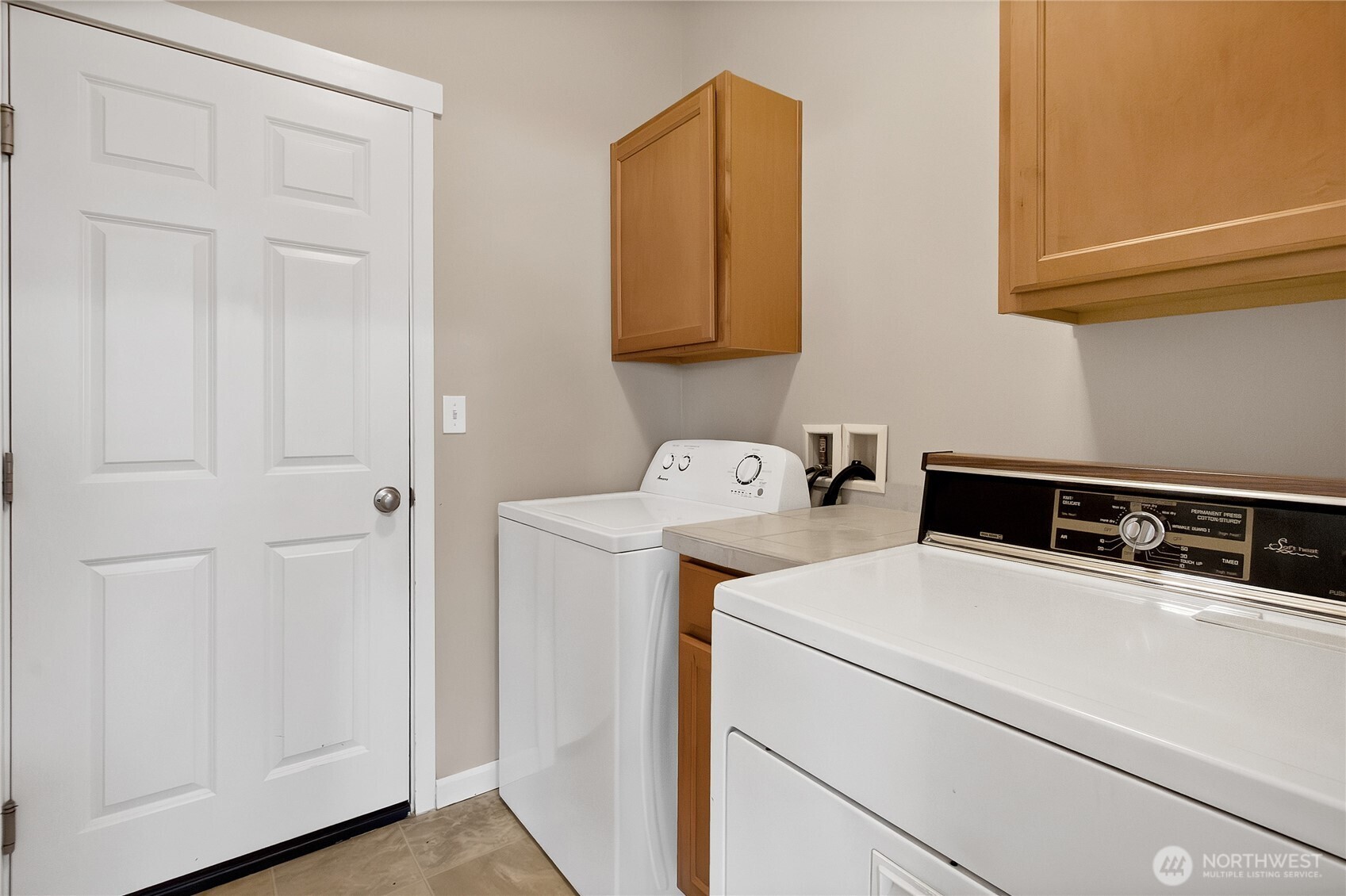 509 Balmer Street Southwest Orting, WA 98360 - Photo 15 of 22 a utility room with dryer and washer