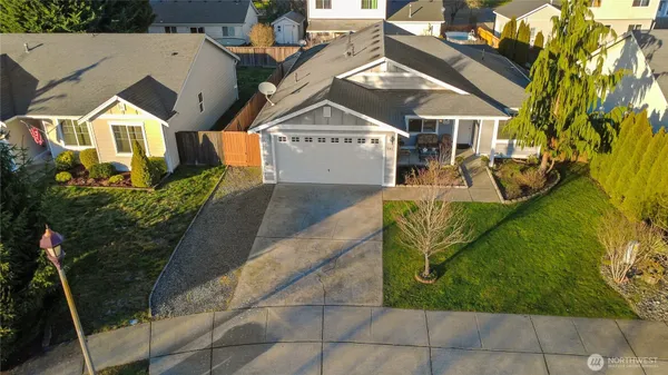 a view of a house with a park