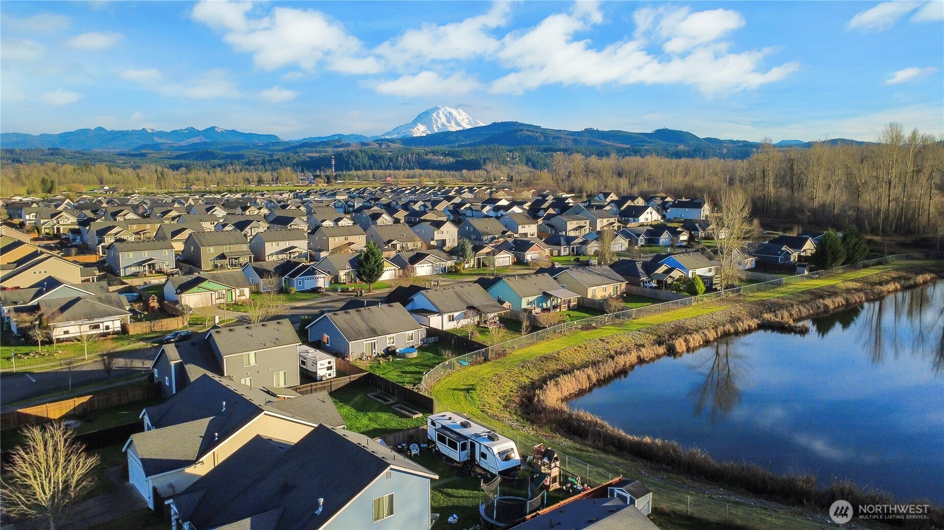 509 Balmer Street Southwest Orting, WA 98360 - Photo 21 of 22 an aerial view of residential houses with outdoor space