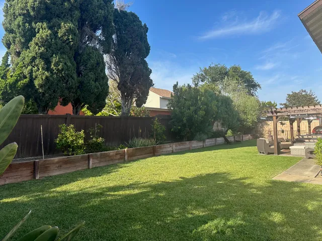 a view of a outdoor space with a swimming pool