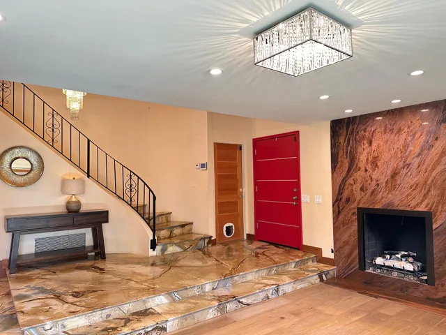 a view of an entryway with a fireplace