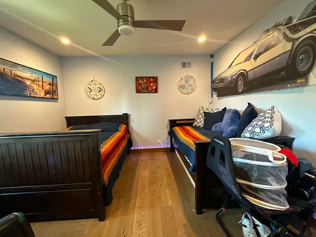 a bedroom with furniture and a bed