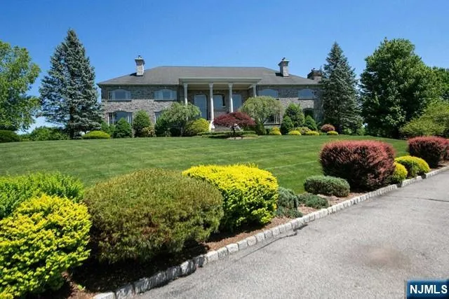 a view of a living room and entry way