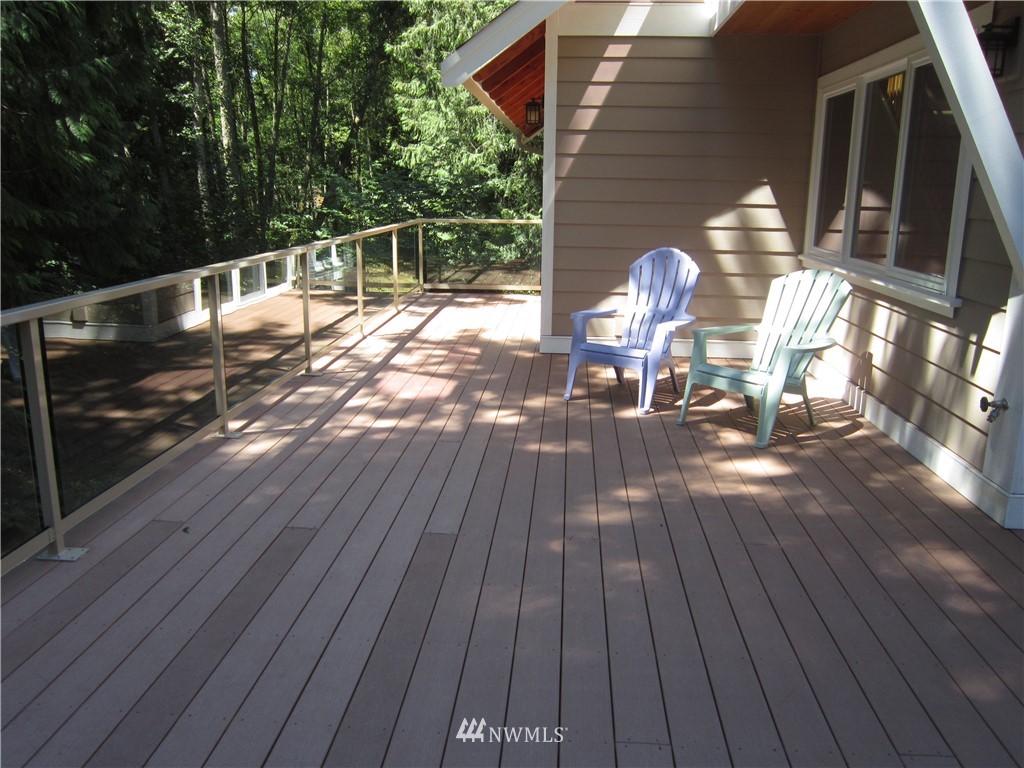 3540 7075 South Clinton, WA 98236 - Photo 18 of 25 a view of balcony with deck and outdoor space